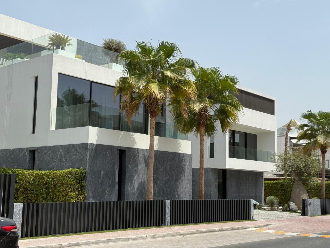 Professional property inspector examining a Dubai villa